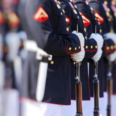 Soldiers standing in a line wearing uniforms